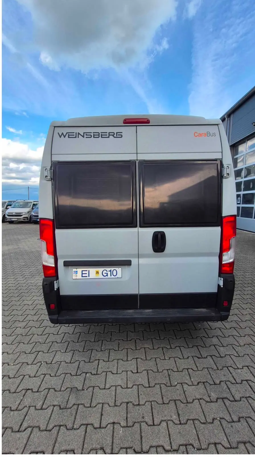 Rear of the Fiat Ducato Weinsberg CaraBus campervan with the doors closed