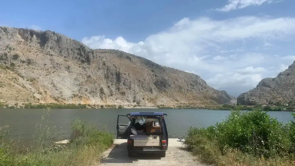 Albania lake with camper van