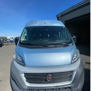 Front view of a blue Fiat Ducato campervan by Govan.al